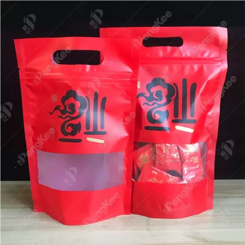 CHINESE NEW YEAR STAND-UP ZIP LOCK BAG WITH HANDLE"福猪手挽 100'S/PKT